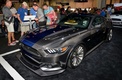 Карбоновый <strong>Ford Mustang от ателье Speedkore Performance Group</strong>. Модель оснащена турбонагнетателем Whipple Stage 2, который заставляет мотор выдавать 825 лошадиных сил. В числе других новоприобретений – пружины и стабилизаторы Eibach, колеса HRE и кожаная обивка Gabe's Custom interiors