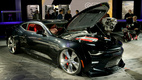 <strong>Chevrolet Camaro SS Slammer Concept</strong>. В этом прототипе кузов стандартного купе Camaro SS был расширен и прижат к земле, насколько это только позволяют огромные хромированные диски колес (22 дюйма спереди и 24 дюйма сзади)