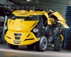 <strong>Land Rover city cab</strong> из фильма «Судья Дредд» (1995 год)<p> Хотя эта машина больше похожа на военный броневичок, в суровом мире 2139 года она используется как автомобиль такси