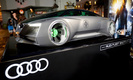 <strong>Audi fleet shuttle quattro </strong> из фильма «Игра Эндера» (2013 год) <p> Разработкой автомобиля для фантастического фильма «Игра Эндера» (Ender’s Game) тоже занимались дизайнеры Audi. На этот раз автомобилю предстояло сыграть роль служебной правительственной машины 2135 года, то есть «заглянуть» в будущее на 100 лет дальше, чем RSQ с его колесами-сферами